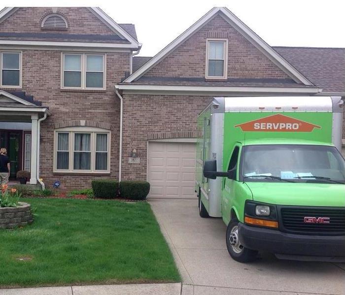 This picture shows one of our service trucks in front of a home. We are going to load the homes contents into it. 